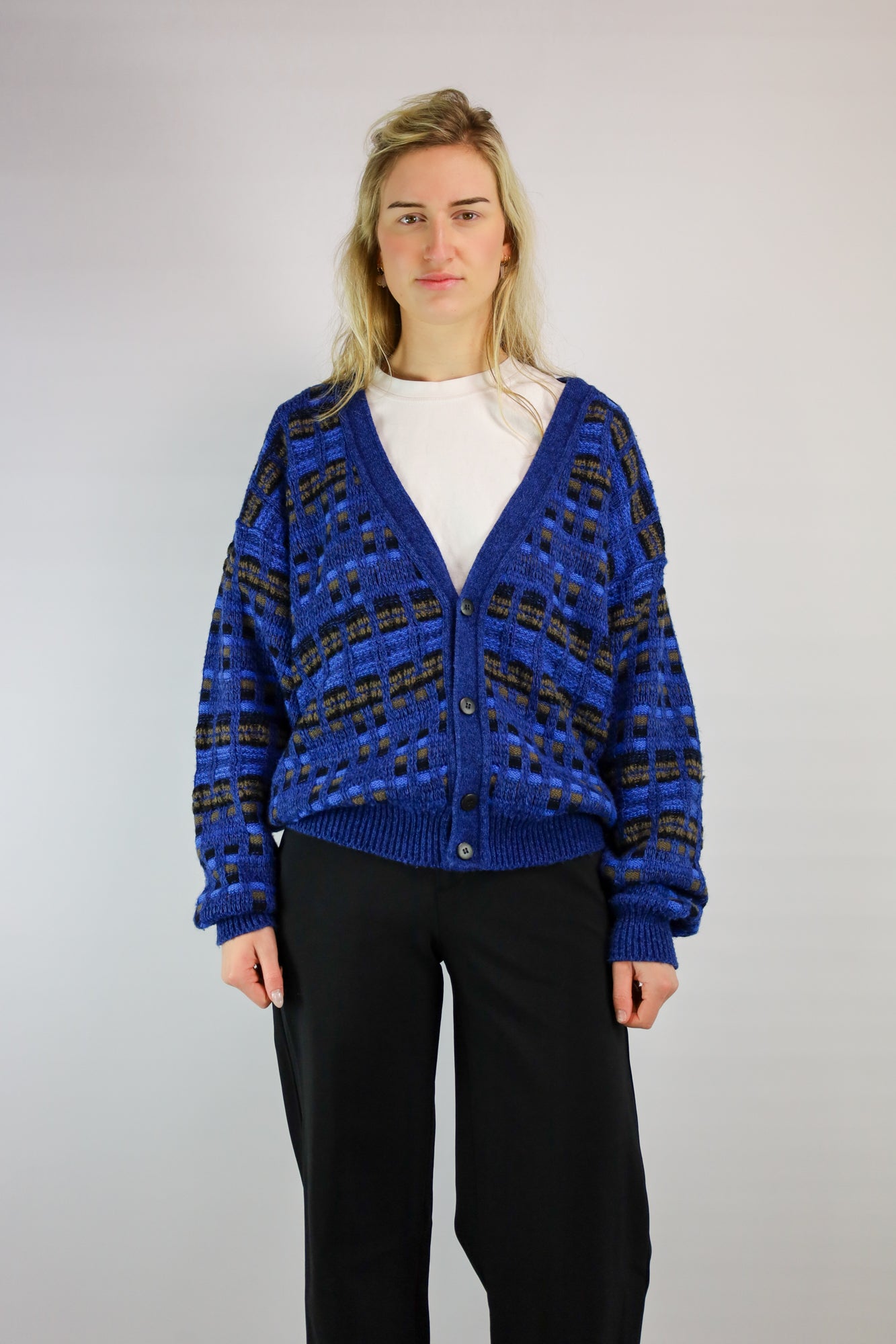 Casual oversized vest met ingebreid blokpatroon, perfect voor koude dagen.