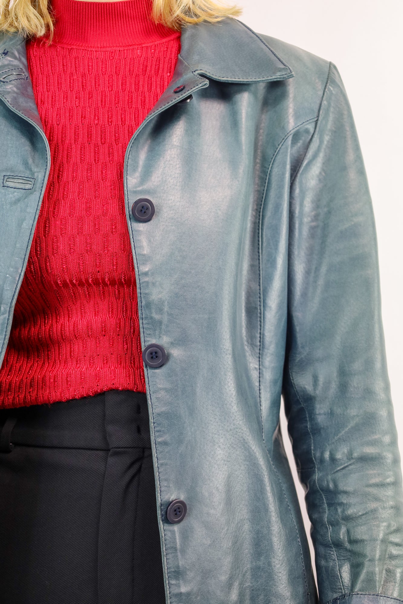 Detail van het soepele leer en de gevoerde binnenkant.