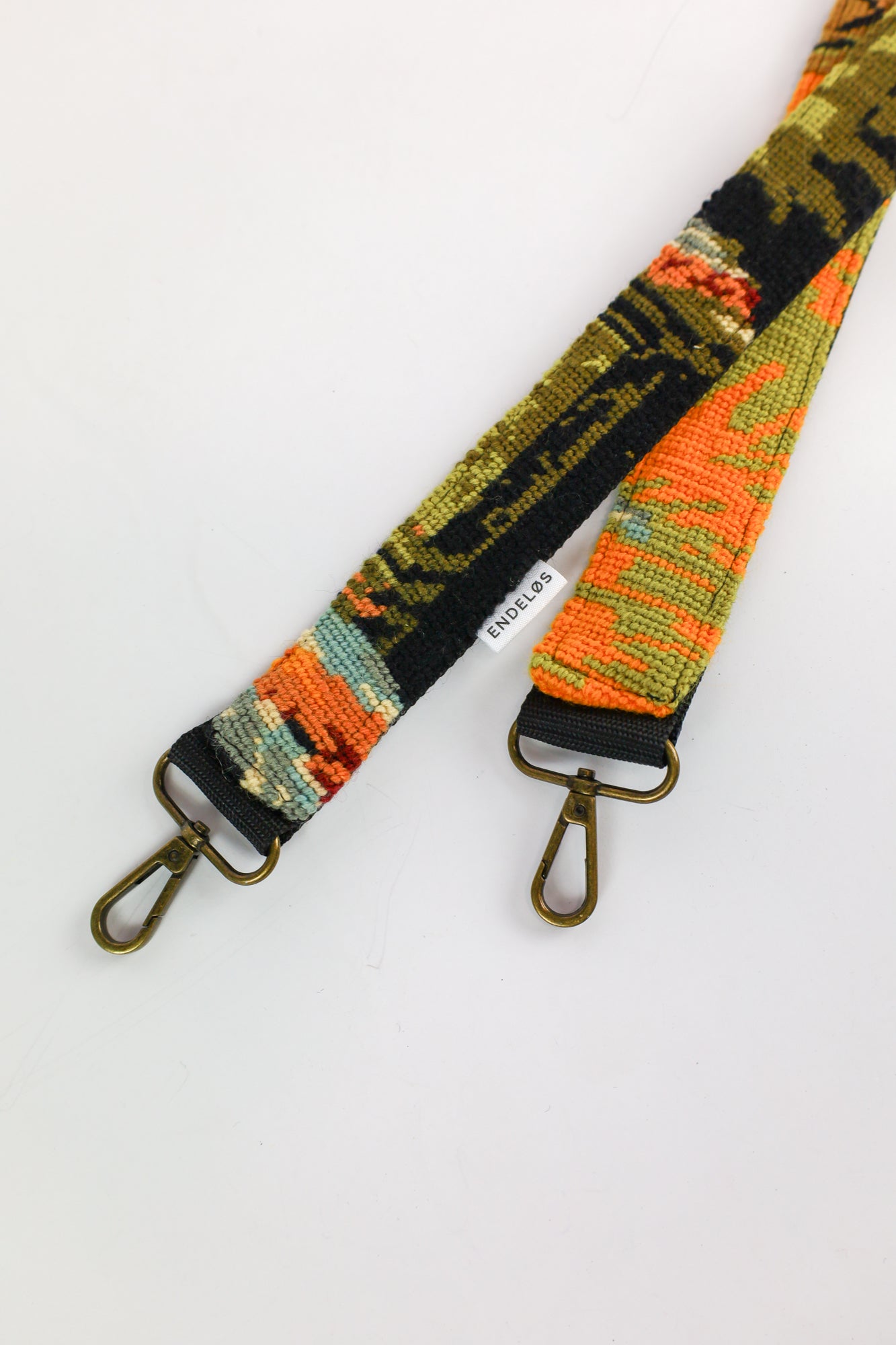 Strap with an embroidered vintage painting in bold orange tones, a unique and eco-friendly accessory for your items.