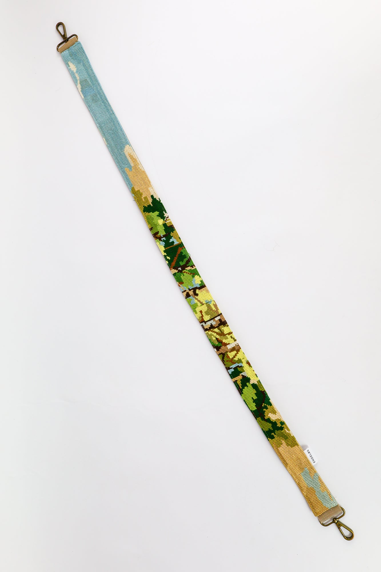 Strap made from embroidery with beautiful nature tones, a unique and eco-friendly addition to your bag, phone, or camera.