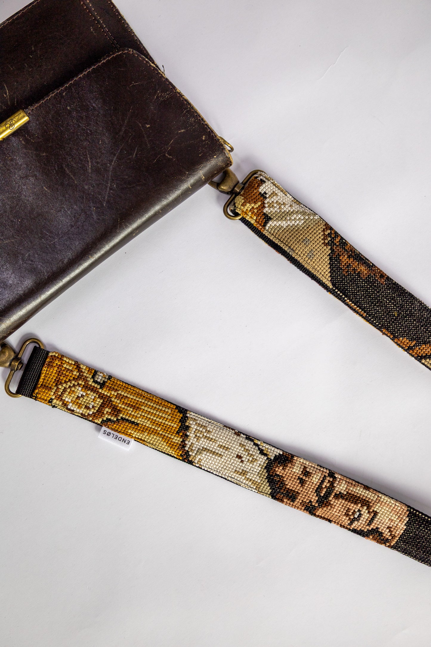 strap van vintage borduurwerk - man met hoed - verstelbaar