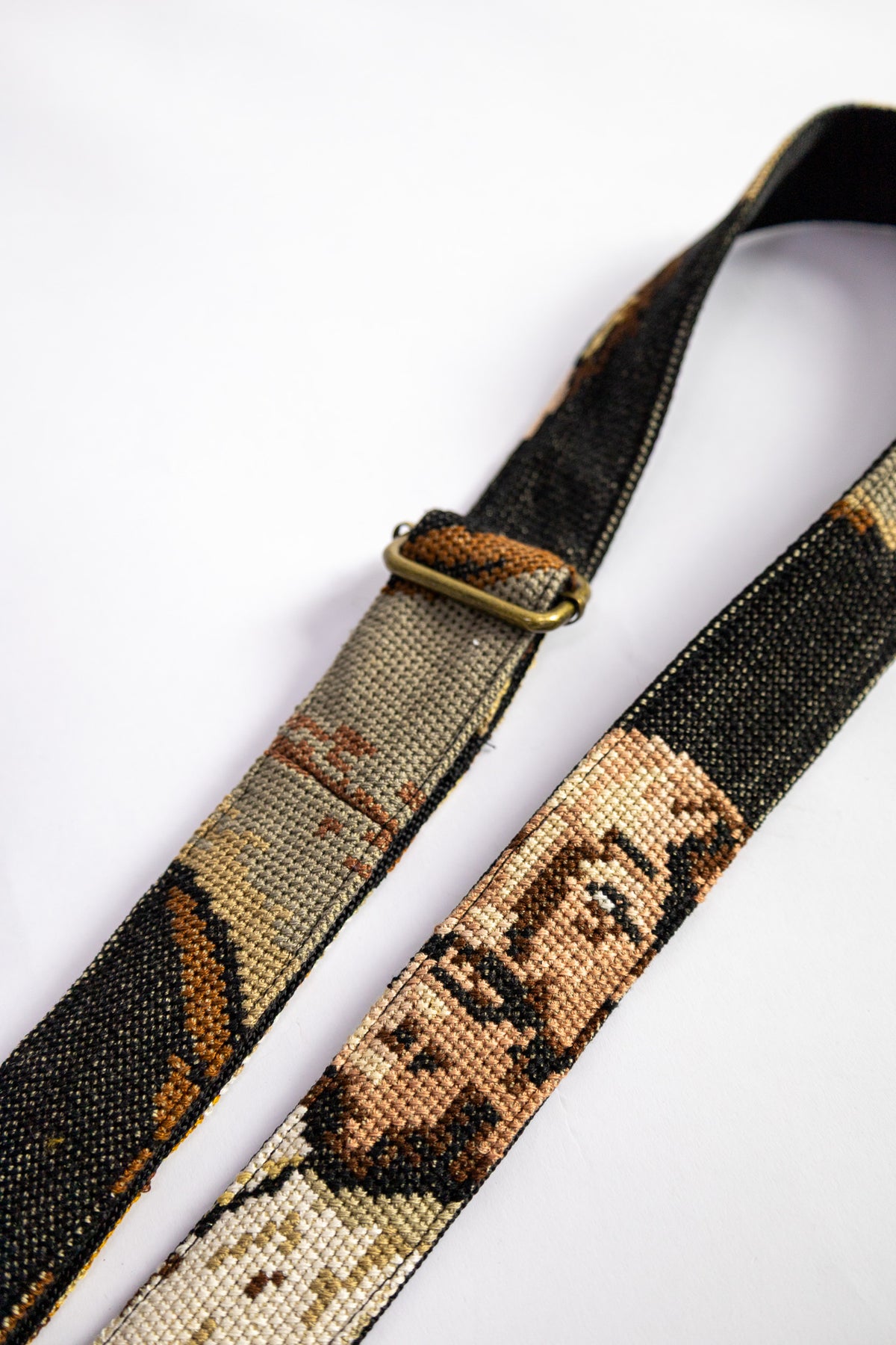 strap van vintage borduurwerk - man met hoed - verstelbaar