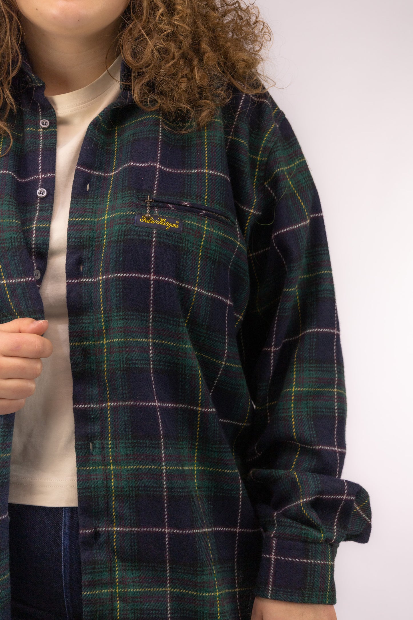 Detail van blauw-groene buffalo check ruitprint op vintage blouse