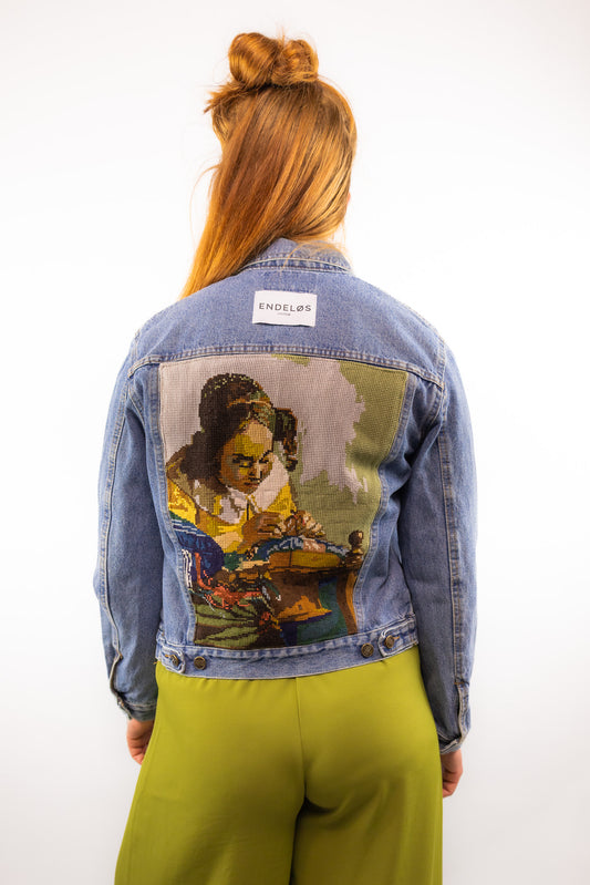 vintage denim jacket with tapestry on back