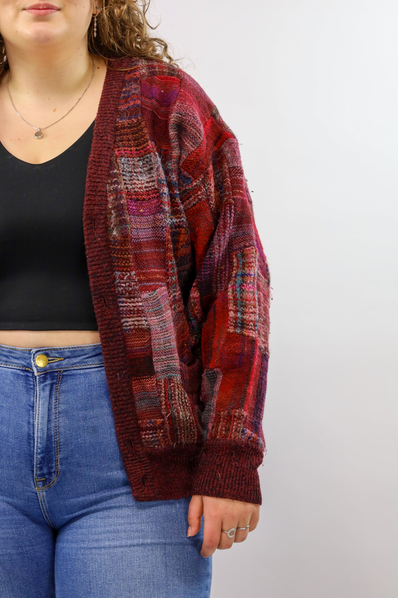 Detail van het handgemaakte patchwork patroon op een vintage vest.